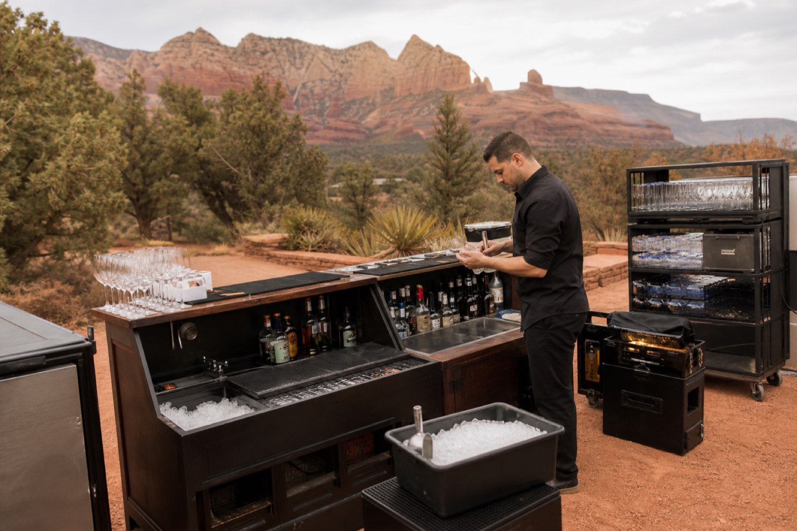 Bartender staging a mobile bar before a Sedona wedding